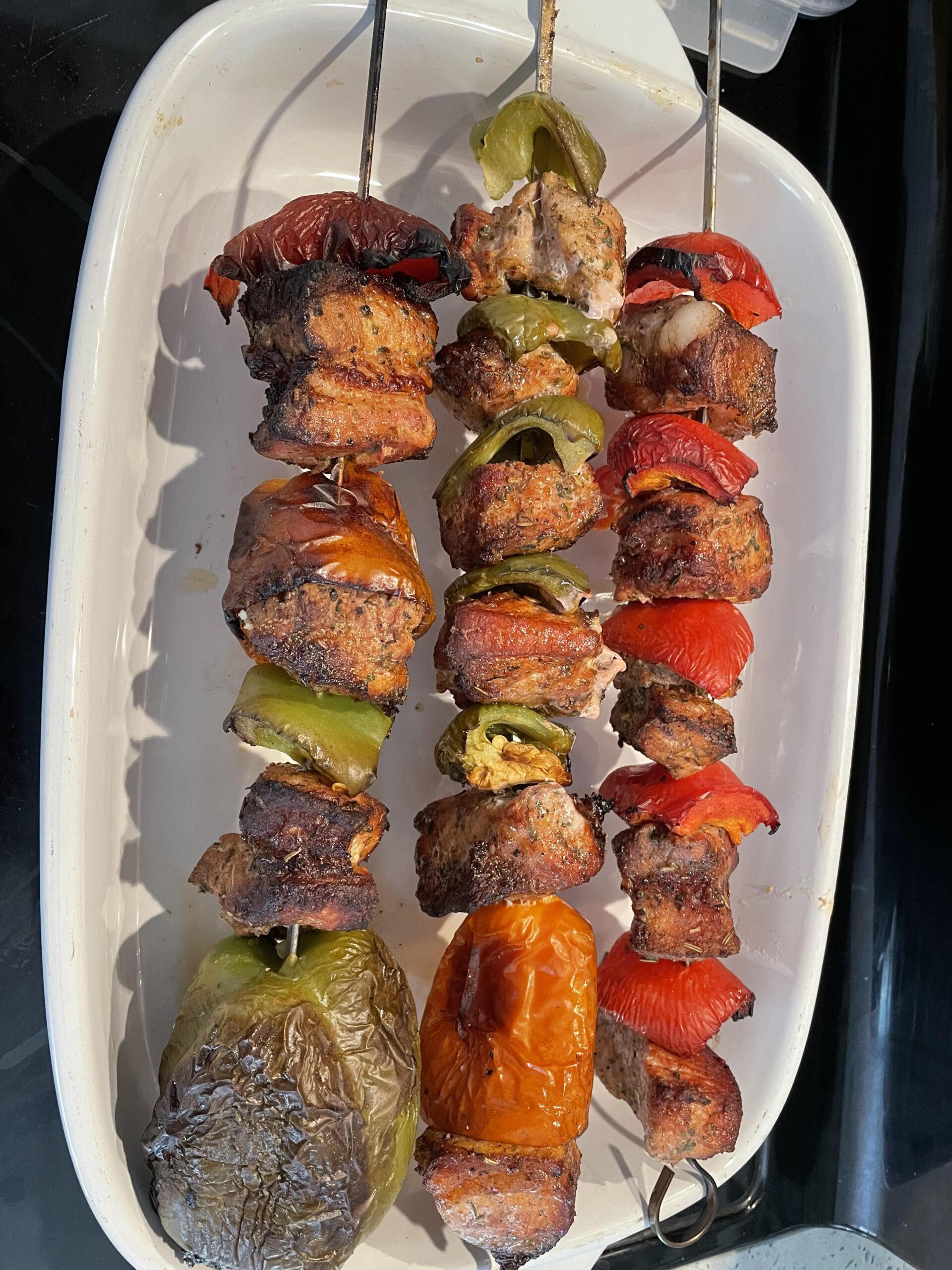 Premium AI Image  There are skewered meats on skewers on a cutting board  generative ai